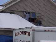 Jamie and Dennis taking out window 1 19 04