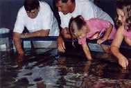 Dad Me Katie at touch tank in aquarium 7 02