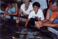 Mom Michael at touch tank in aquarium 7 02