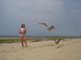 Katie feeding gulls CC 2007